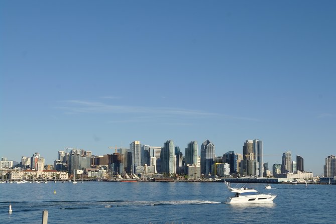 Downtown to Balboa Park Tour - USS Midway and the Unconditional Surrender Statue Ride-By