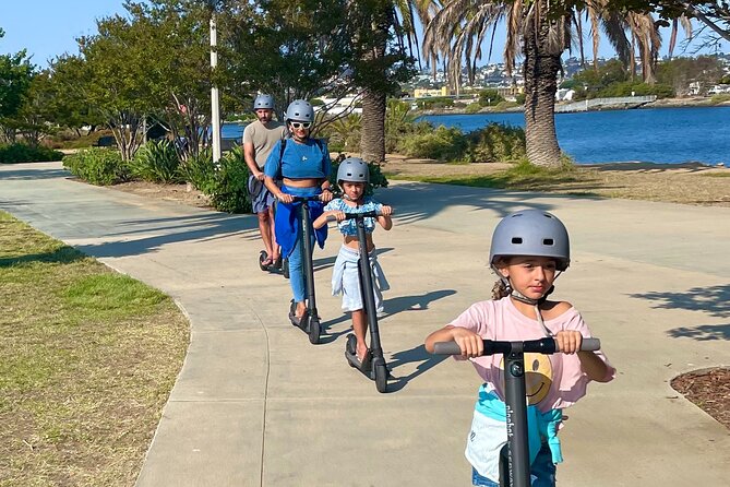 Electric Scooter Waterfront Tour with Pictures - What You Get (and Why It Matters): Helmets, Scooters, Backpacks, and Photos