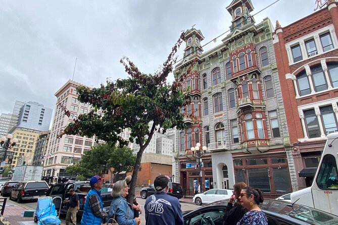 San Diego Gaslamp Quarter Small Group Walking Tour - Ghirardelli’s 1913 theatre past and the Old Spaghetti Factory building